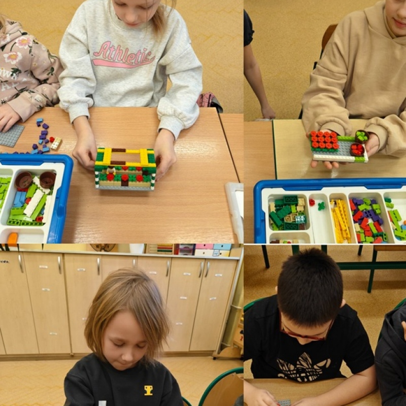 uczniowie budują z klocków lego